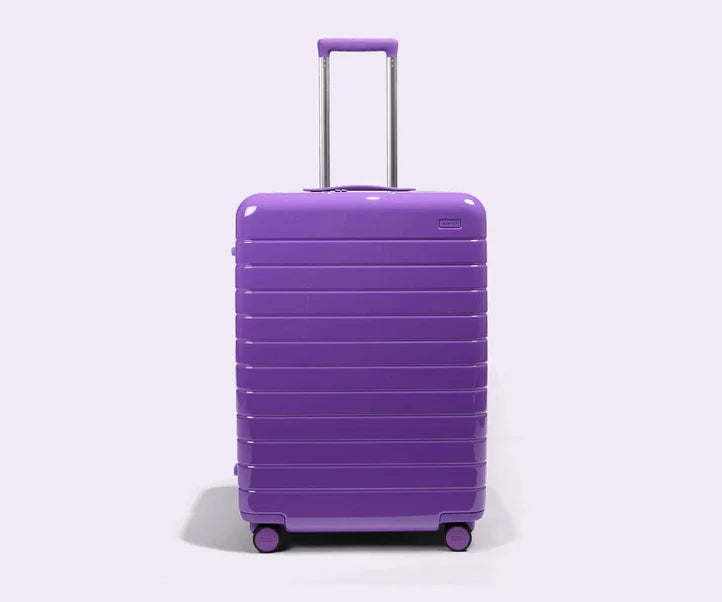 Check-In The Medium in Buzz Lightyear Purple Luggage