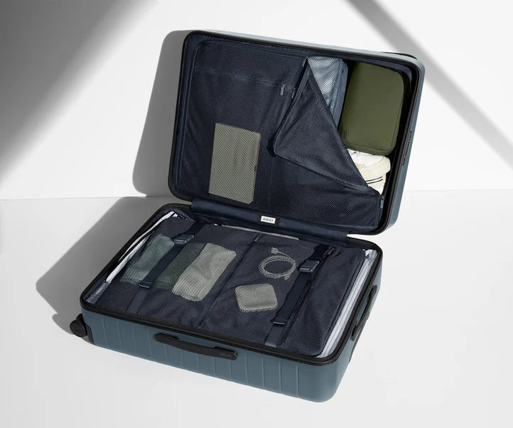 Check-In The Large in Coast Blue Luggage