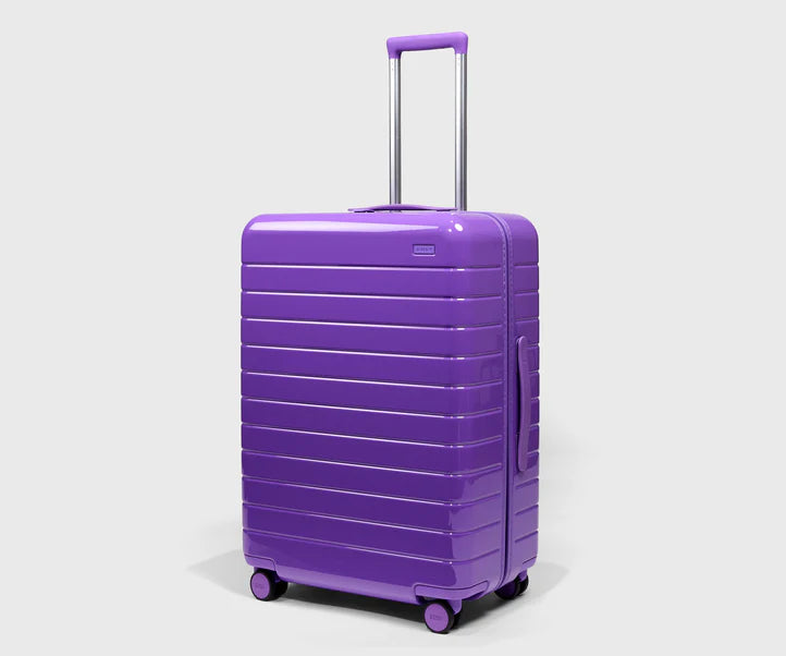 Check-In The Medium in Buzz Lightyear Purple Luggage