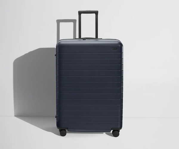 Check-In The Large Flex in Navy Blue Luggage